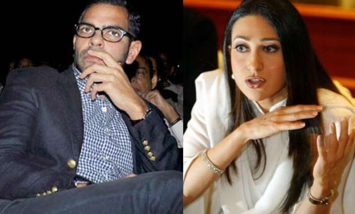 sunjay is residing with another woman and her child karisma