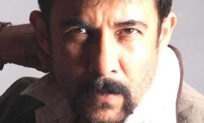 deepak tijori wins battle against housing society