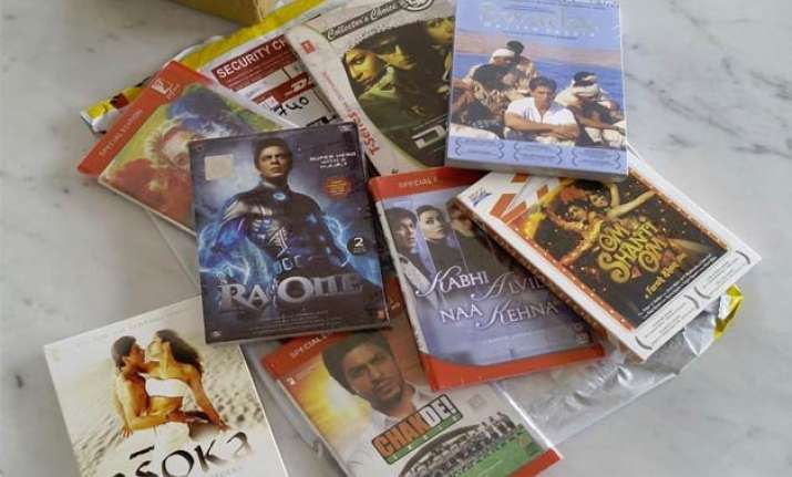 from bollywood with love srk gifts his films to paulo coelho
