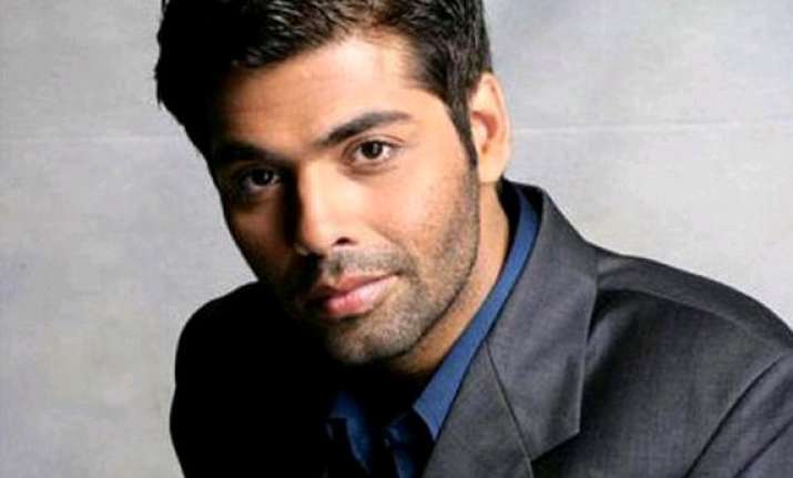karan johar to be part of tamil action drama vettai remake