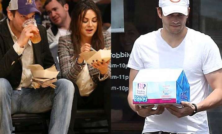 pregnancy cravings ashton kutcher stocks up ice cream for