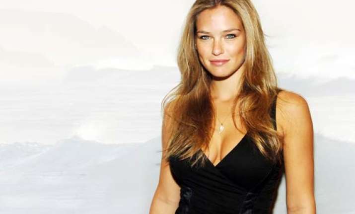 bar refaeli poses topless in war themed issue of magazine