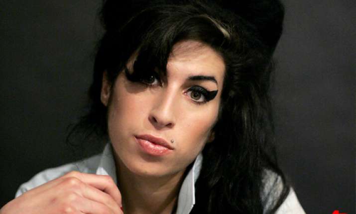 coroner says amy winehouse died from too much alcohol