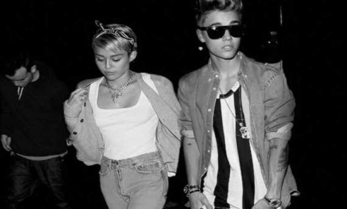 cyrus advises justin bieber to take a break