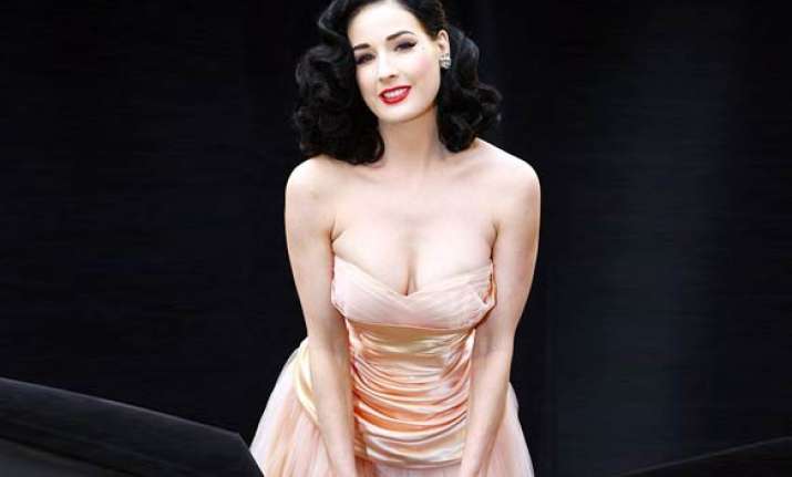 dita von teese strips off in racy new renault clio tv