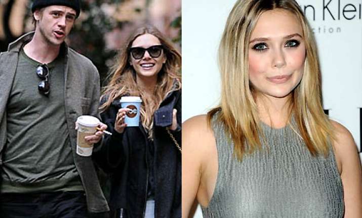 elizabeth olsen not eager to star a family