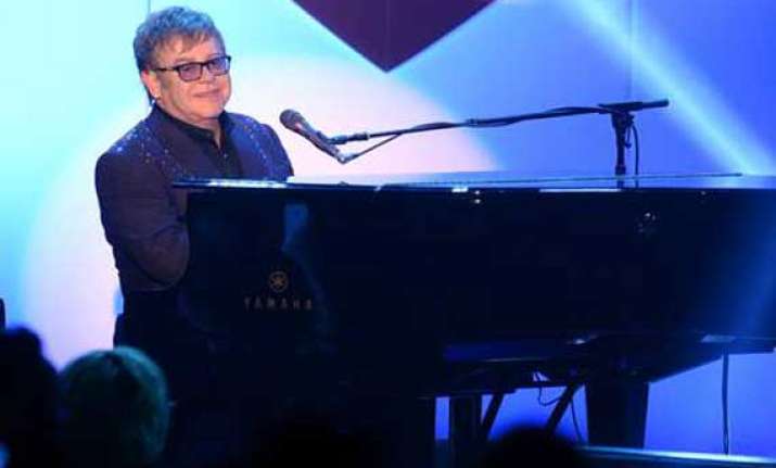 elton john to receive brits icon award