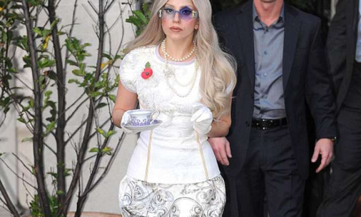 gaga on wheelchair post surgery