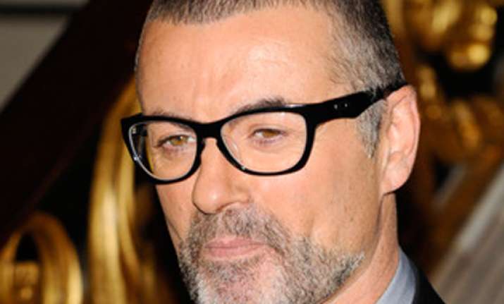 george michael treated for pneumonia cancels tour