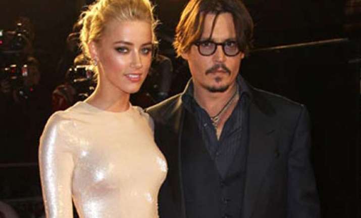 heard telling everyone about relation with depp