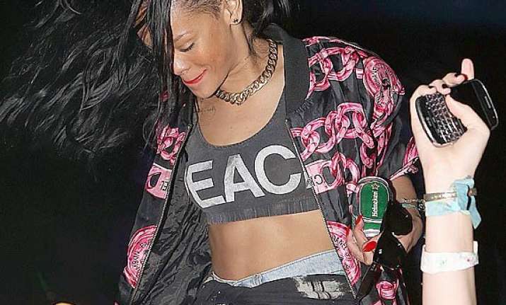 heartbroken rihanna partying hard friends worried
