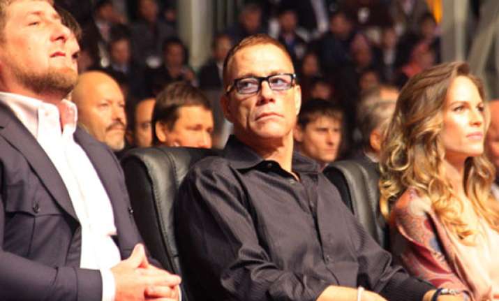hilary swank jean claude van damme slammed for attending