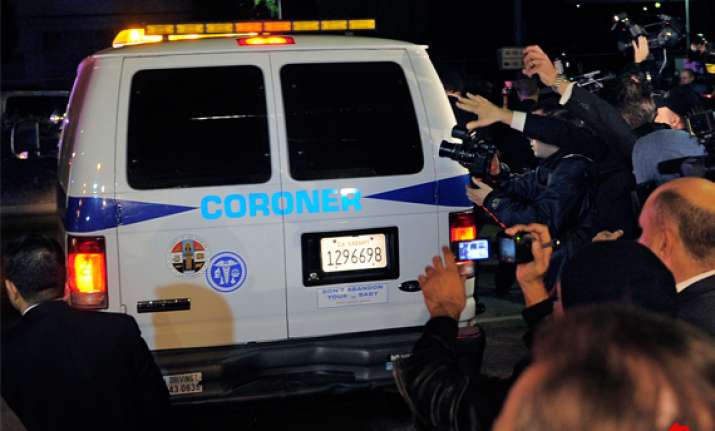 houston s body taken to morgue autopsy planned
