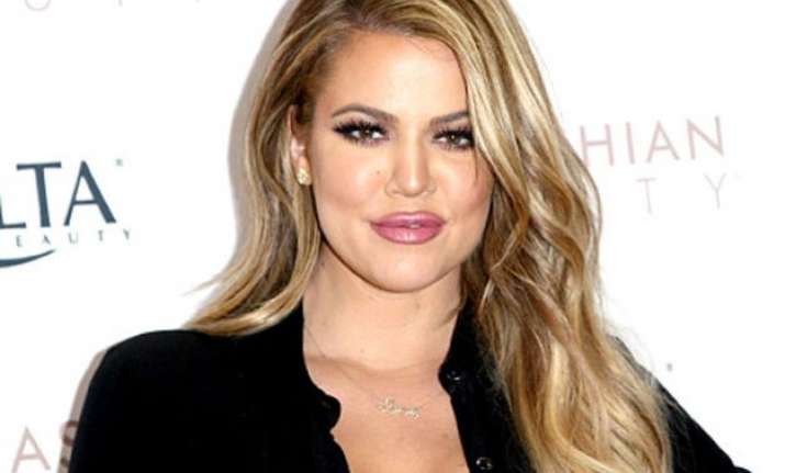 kim kardashian s sister khloe goes naked for cover of her