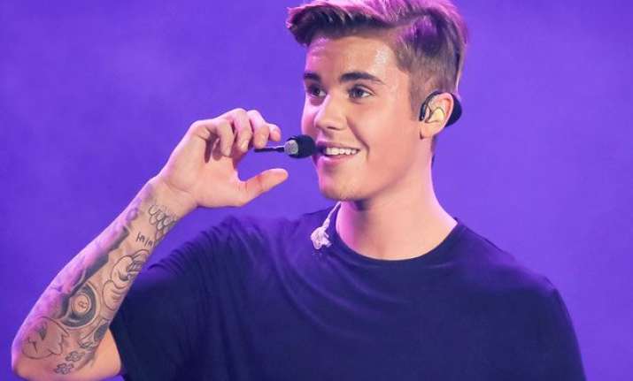 justin bieber gets new tattoo
