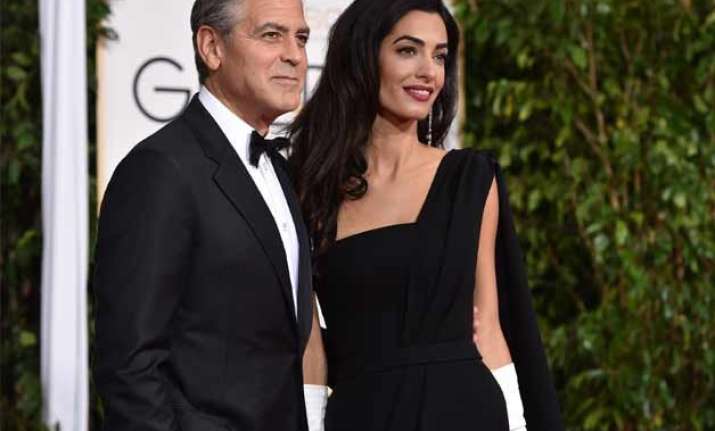 george clooney plans baby with amal