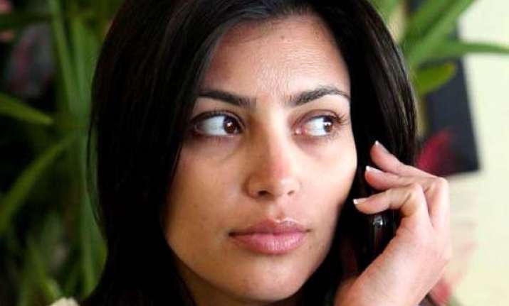 motherhood made kim kardashian go less on make up