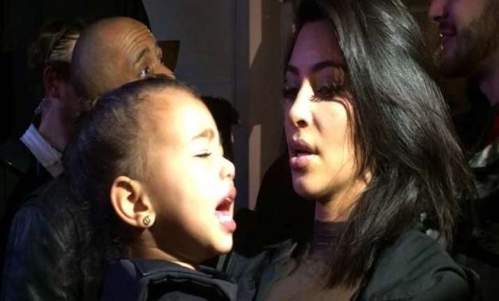 kim takes daughter on easter egg hunt