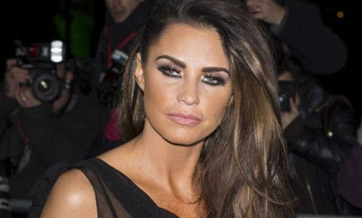 katie price plans to sell old breast implants for charity