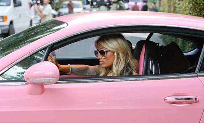 paris hilton gets a matching pink removal van