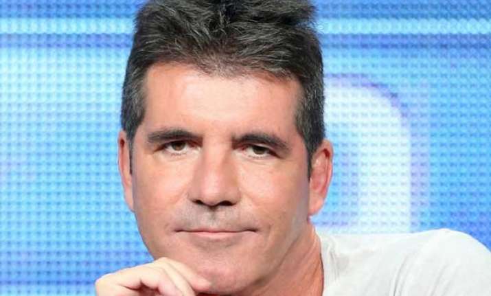 tomlinson cowell trying to form girl band