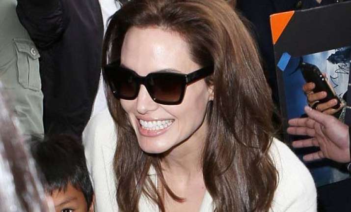 angelina jolie survives a car crash