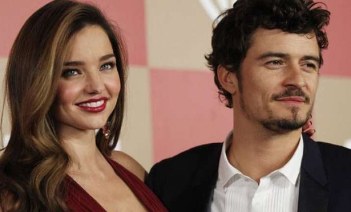 miranda kerr orlando bloom still close to each other