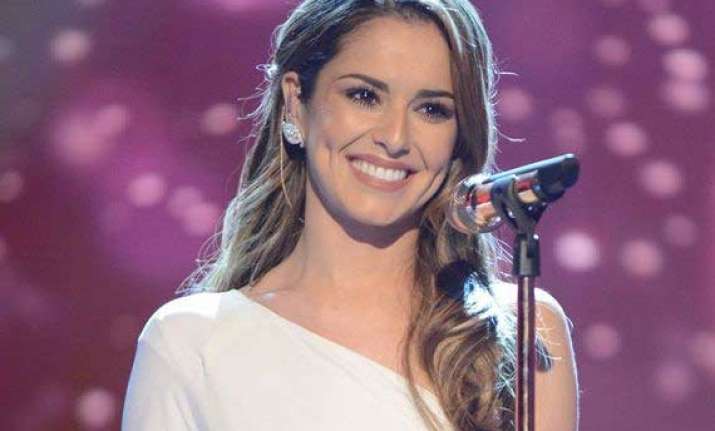 cheryl fernandez versini bounces back after throat infection