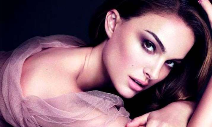 natalie portman honoured to be face of dior