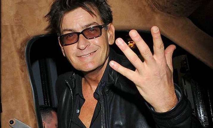 charlie sheen sued for sexual assault