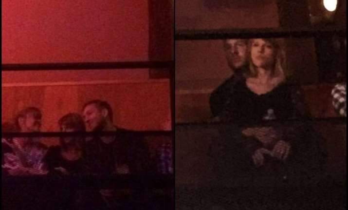 taylor swift beau calvin harris spotted in romantic embrace