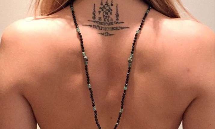 cara delevingne shares her topless photo online