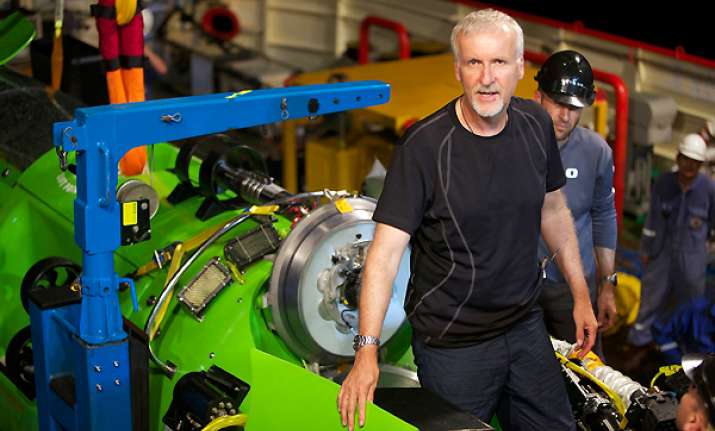cameron completes journey to earth s deepest point