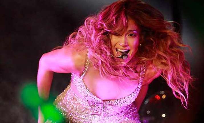 jennifer lopez stuns fans in shanghai with a glittering cane