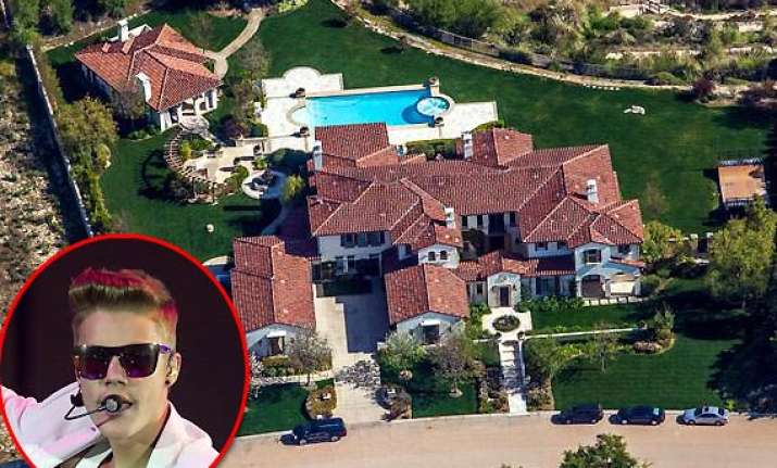 justin bieber to pay 85 000 bill before he sells house to