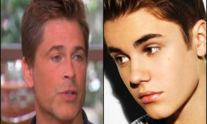 justin bieber knows his dark secret rob lowe