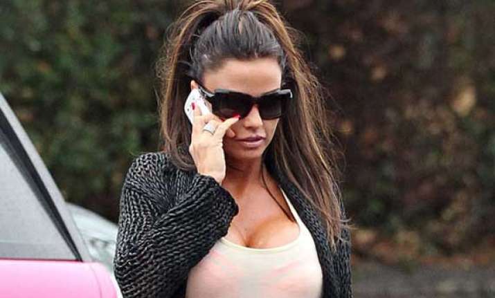 katie price reveals baby bump