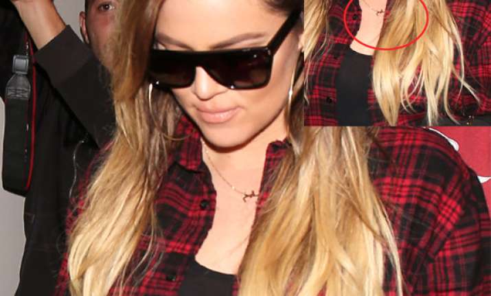 khloe kardashian flaunts montana s name around her neck
