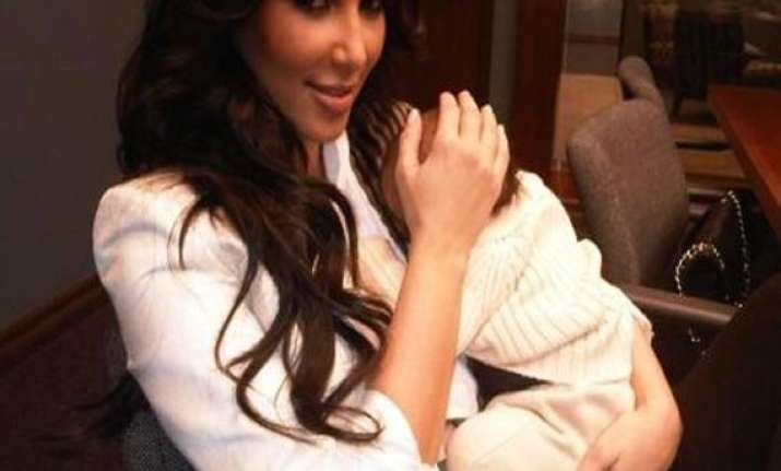 kim happy babysitting daughter