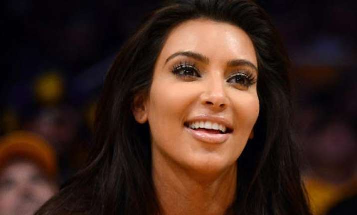 kim spends thousands for first child
