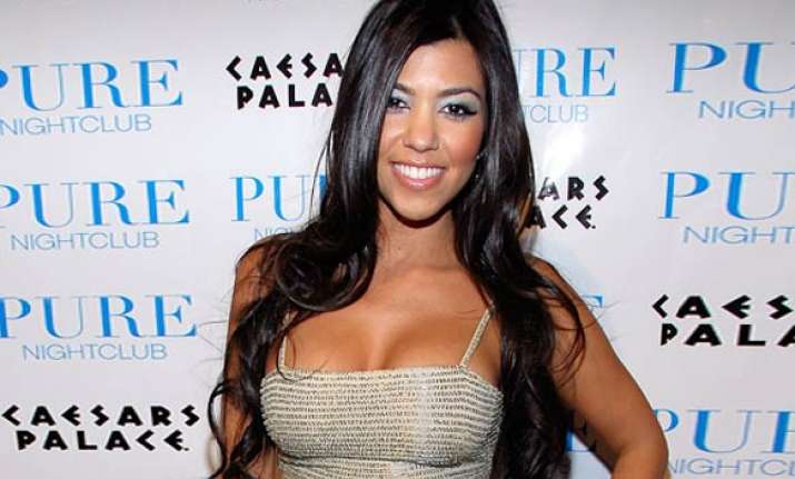 kourtney kardashian dismisses engagement rumors