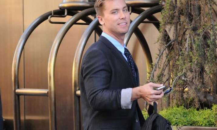 lance bass feels someone in one direction is gay