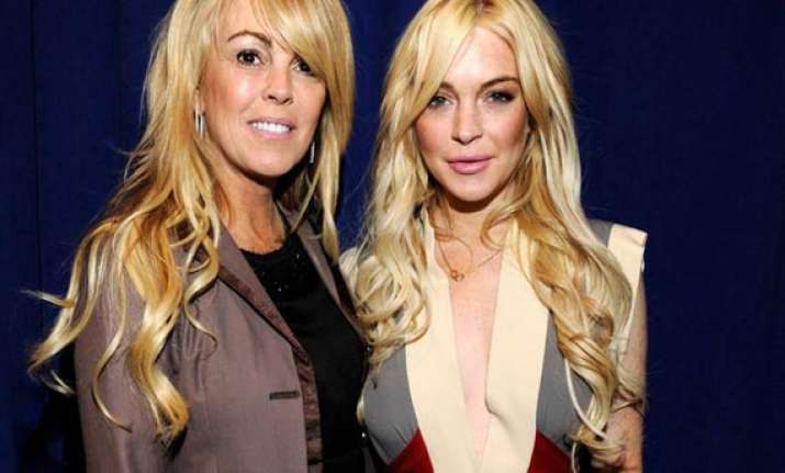 lindsay lohan buys symbolic jewellery for family