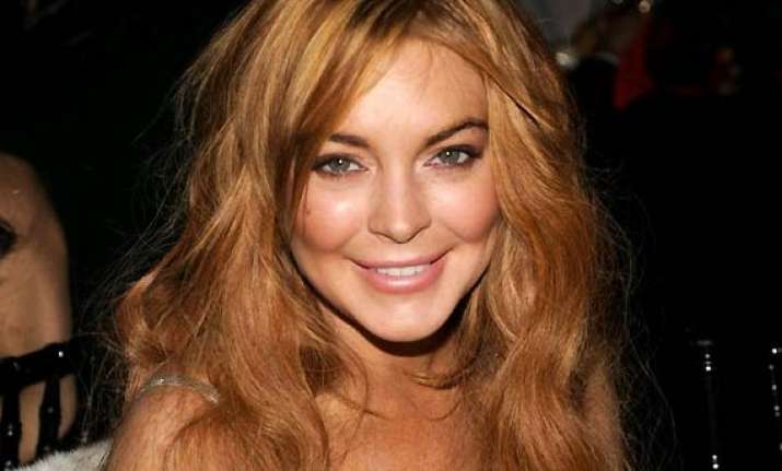 lindsay lohan settles dispute with clothing firm