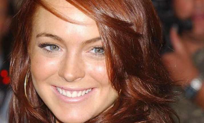 lindsay lohan s coach quits on reality show