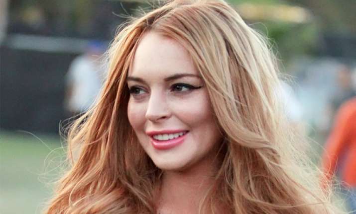 lindsay lohan ok after wreck on coastal highway