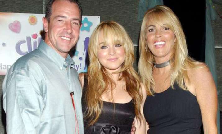 lohan s parents banned from reality show