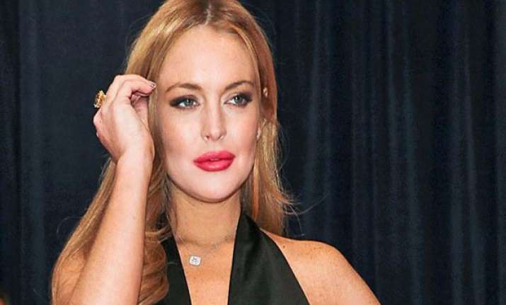 lohan selling clothes to pay tax