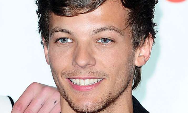 louis tomlinson wishes for normal life