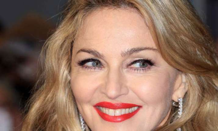 madonna to direct adaptation of novel ade a love story